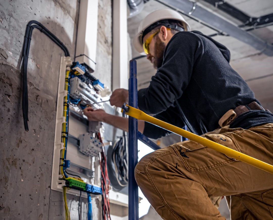 Man with electrical wiring.